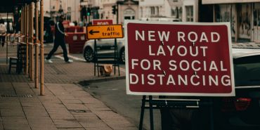 Social distancing road sign